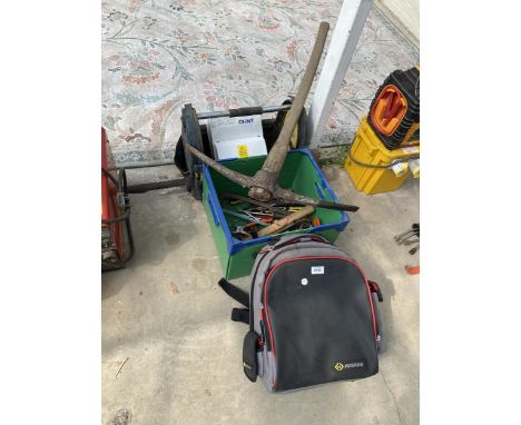 AN ASSORTMENT OF TOOLS TO INCLUDE SCREW DRIVERS AND A PICK AXE ETC