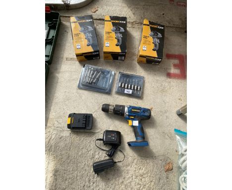 A WORKZONE BATTERY DRILL WITH CHARGER, THREE WORKZONE TABLE VICES AND ROUTER BITS ETC
