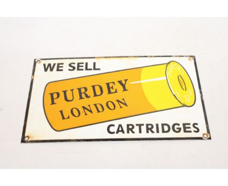 AN ENAMEL PURDEY CARTRIDGES LONDON SIGN - 36 X 21 CM