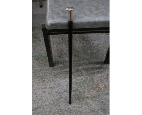 A WHITE METAL TOPPED EBONIZED SWAGGER STICK