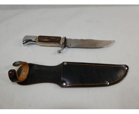 A HUNTING KNIFE AND SCABBARD,13CM BLADE, LENGTH 25CM