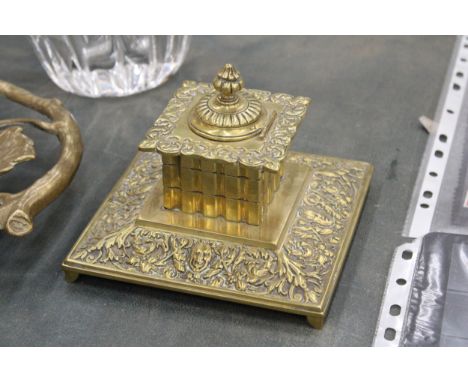A VICTORIAN STYLE BRASS INKWELL