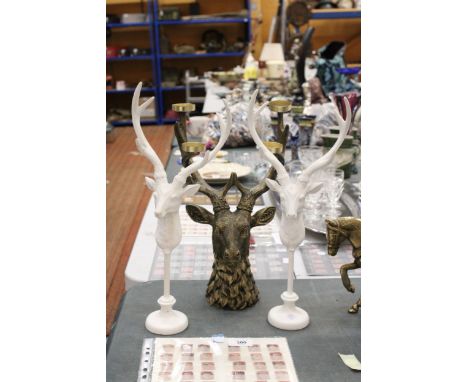 A LARGE HEAVY STAG CANDLEHOLDER AND A PAIR OF STAG MOUNTINGS