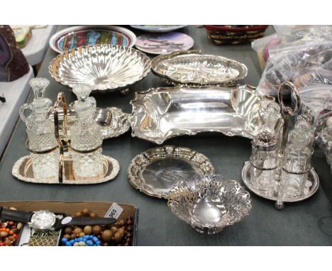 A QUANTITY OF SILVER PLATED ITEMS TO INCLUDE TWO CONDIMENT SETS WITH GLASS BOTTLES, SERVING DISHES, BUTTER DISH AND FLATWARE
