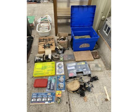 A LARGE ASSORTMENT OF FISHING TACKLE TO INCLUDE REELS, HOOKS, LINES AND FLOATS ETC