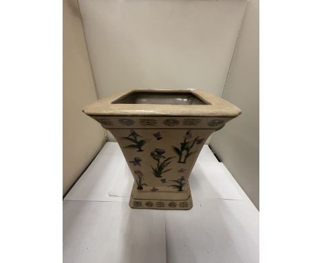 A VINTAGE STONEWARE PLANTER WITH FLORAL DESIGN