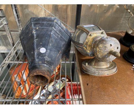 A VINTAGE CAST IRON GUTTER HOPPER AND AND DECORATIVE WALL LIGHT