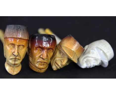 Four 19th century portrait clay pipes, comprising Gladstone, General Gordon, and two of Charles De Gaulle (4)