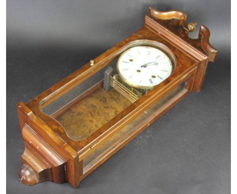 A Comitti of London walnut wall clock, enamel Roman numeral dial and movement striking on five gongs, 54cm