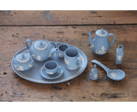 A Wedgwood blue jasper cameo ware miniature tea and coffee service and other miniature wares, to include; a teapot, coffee po