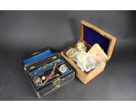 Two jewellery cases containing a collection of Georgian and later jewellery, to include; cultured pearls necklaces, watches, 