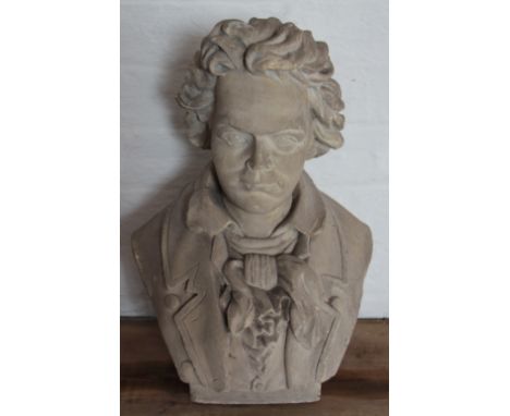 A reconstituted stone bust of Beethoven, 47cm and a smaller bronzed plaster model of Beethoven, 25cm (2)