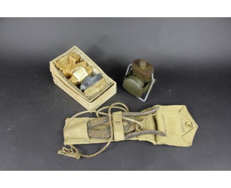 Five World War II military issue rubber No.9 range targets, in original box, with a WWII military issue pair of wire cutters 