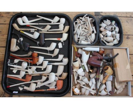 A collection of 19th century and later clay pipes and fragments, to include Crok stamped pipes, a Pipe in the form of a skull