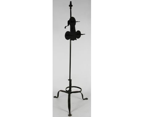An 18th century and later wrought iron lark spit, with trefoil shaped top on tripod base, 89cm