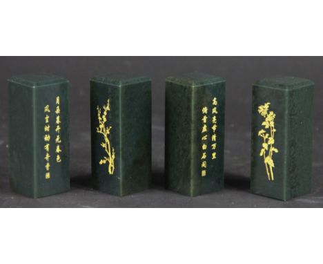 Four Chinese green nephrite gilt scroll weights