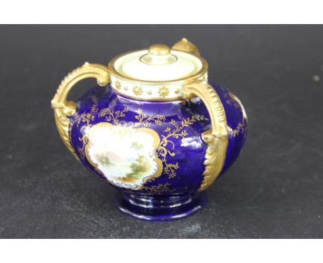 A Coalport three handled vase, enamelled with a named view of Loch Tay, with pattern 5146/R shape number S/S 262 (restored) 1