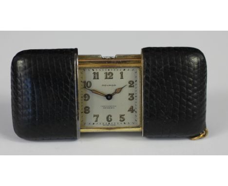 A Movado Chronometer Ermeto silver gilt travelling watch, with Arabic dial, the back numbered 1208375, leather cover