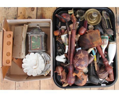 An assortment of clay, porcelain and treen pipes, match strikes etc; with a 19th century painted lead tobacco box decorated w