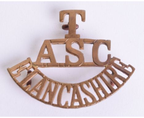 Great War Army Service Corps Territorial Shoulder Title, brass T/ASC/E.LANCASHIRE with three lug fittings on the reverse. Rem