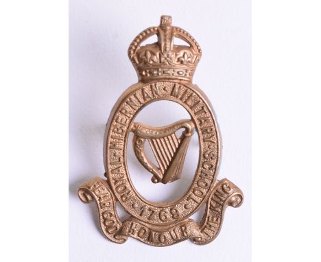 Rare Royal Hibernian Military School Cap Badge Circa 1902-21, brass oval with voided Irish harp to the centre, three piece sc