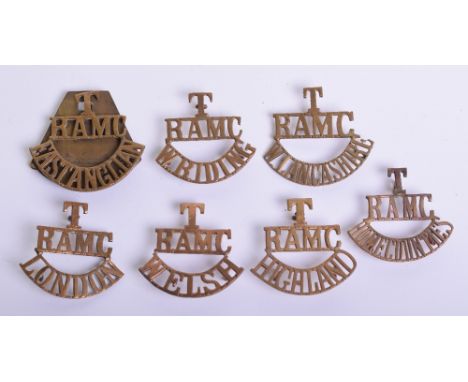 Seven Royal Army Medical Corps Territorial Shoulder Titles, all in brass, consisting of T/RAMC/WELSH, T/RAMC/HIGHLAND, T/RAMC