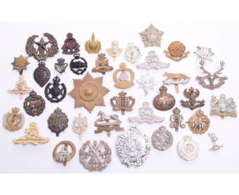 Selection of British Regimental Cap / Headdress Badges, consisting of bi-metal West Yorkshire regiment cap badge with slider 