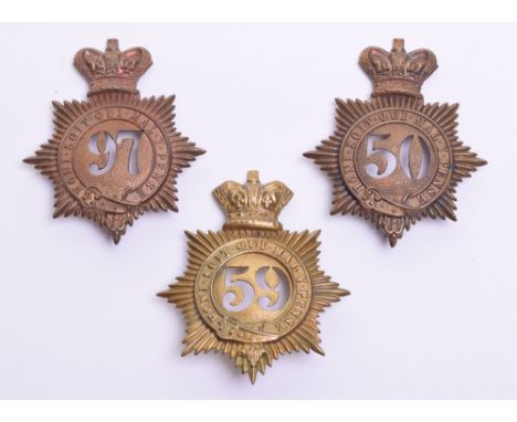 Three 1861 Pattern Shako Plates, consisting of examples for 50th, 59th and 97th regiments of foot. All three have been repair