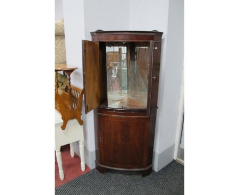 A Mahogany Bow Fronted Corner Cupboard, with low back.