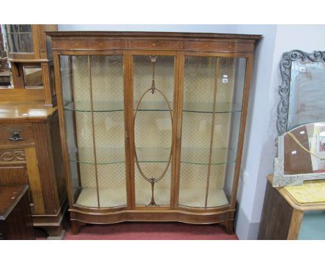 Edwardian Inlaid Mahogany Display Cabinet, with geometric cornice, bowed end doors flanking astragal glazed centre panel, on 