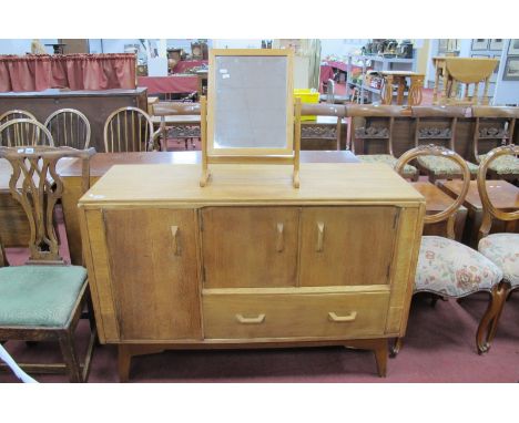 E.Gomme G Plan Light Oak Sideboard, with long cupboard door to left, smaller doors, over single drawer to right, on splayed l