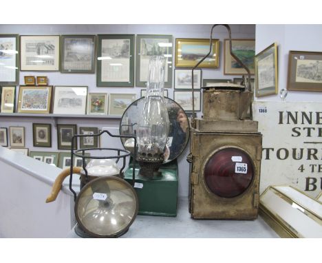 Railway 'BR' Hand Lamp, (red shade cracked), approximately 51cm high with handle up, a green painted oil lamp with circular m