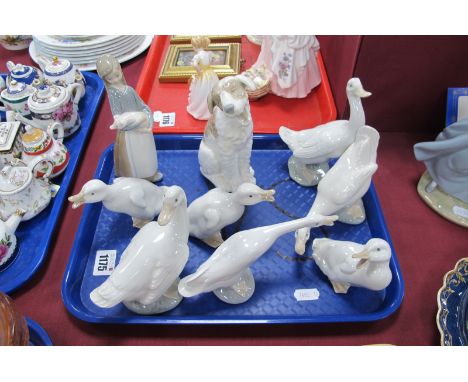 Nao Terrier, Lladro girl holding piglet and goose, six Nao geese:- One Tray