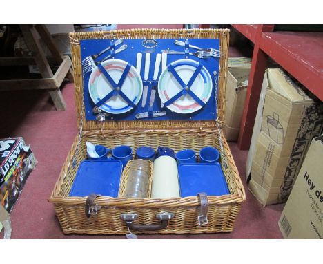 Optima England Picnic Basket, plates, knives, forks, flask, coffee mugs, etc:- in a wicket basket.