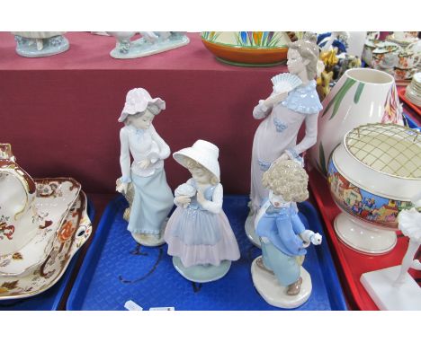 Nao Pottery Figurines - Lady with Fan, clown, lady with dove, girl with flowers. (4)