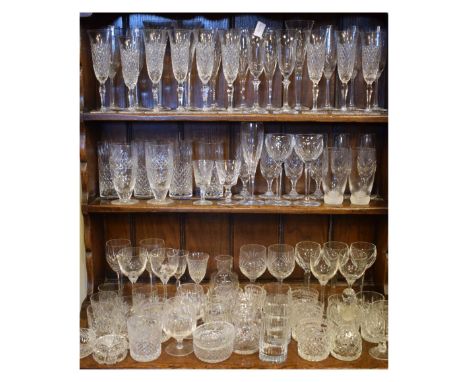 Quantity of table glass to include; tumblers, wine glasses, jugs, champagne flutes, etc Condition: All pieces showing scratch