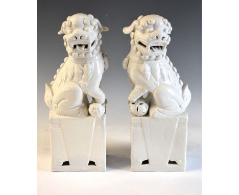 Pair of Chinese blanc de chine Dogs of Fo, 31cm high Condition: Ceramics &amp; Glass/Oriental - We endeavour to mention any p