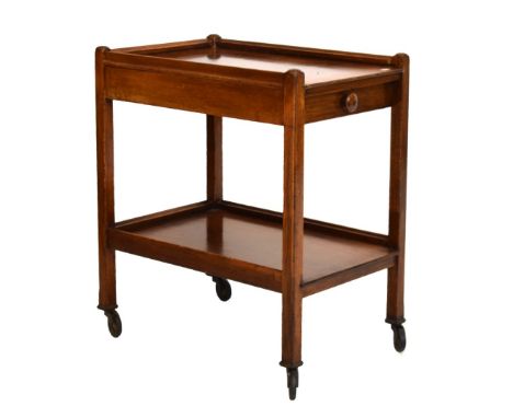20th Century wooden two-tier tea trolley Condition: Light scratches, some discolouration, chips to the wood present in variou