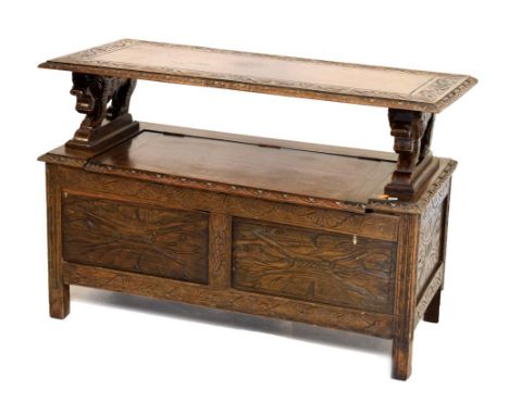 Reproduction carved oak monks bench, 104cm wide approx Condition: Various scratches, nicks and small chips present in various