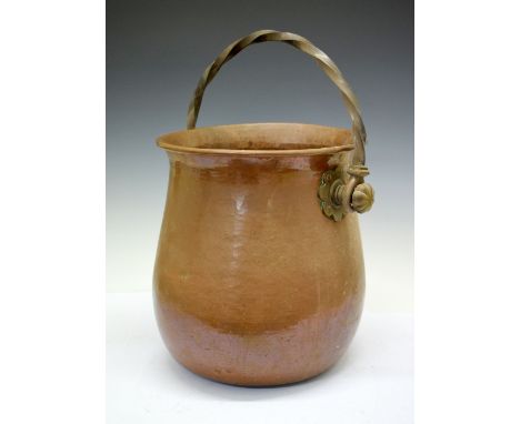 Large copper cauldron log bucket having twisted handle, 35cm x 99cm diameter Condition: Would benefit from a clean, signs of 