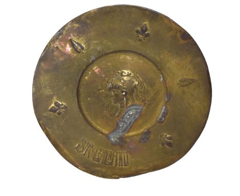 Arts &amp; Crafts-style sheet brass charger with profile portrait of 'Sir Galahad', old depository label of F.L. Pettman Ltd 