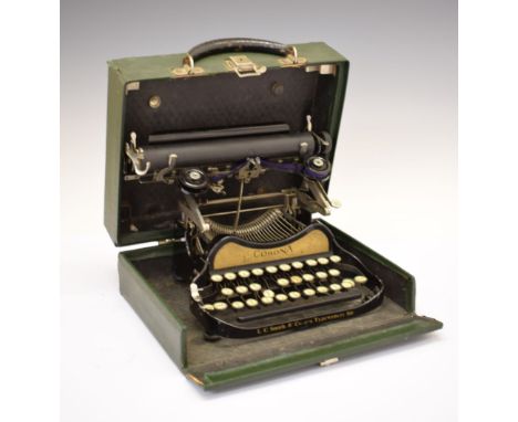 Vintage Corona typewriter, within case Condition: Case having various stains and marks, with general wear and tear to the cor