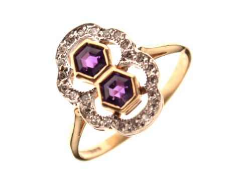 Unusual 9ct gold dress ring set two hexagonal-cut amethyst-coloured stones within a border of small diamond brilliants, size 