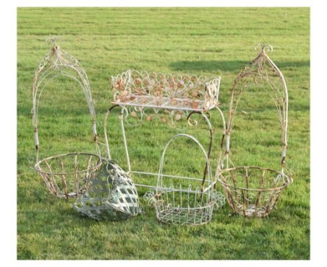 Quantity of modern wirework garden planters to include; hanging baskets, etc (5) Condition: Some light corrosion and loss of 