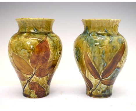 Pair of Doulton Lambeth stoneware vases, 14cm high Condition: Chips and abrasions to rim of one vase, together with minor chi