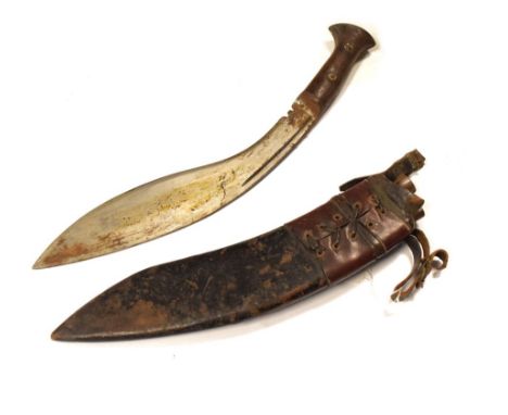Gurkha Kukri, curved blade 33.5cm long of typical form, wooden grip with two rivets in its wooden leather covered sheath with