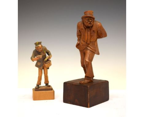 Carved wooden figure of a postman (18cm high), together with a larger figure of a gentleman (28cm high) Condition: Some light