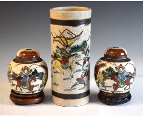 20th Century Chinese three-piece garniture, of crackle glaze sleeve vase and two ginger jars decorated with battle scenes, on