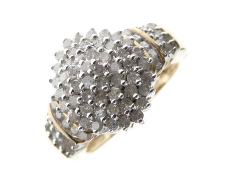 Yellow metal and diamond cluster ring of approximately seventy-nine diamonds including diamond set shoulders, shank stamped 9