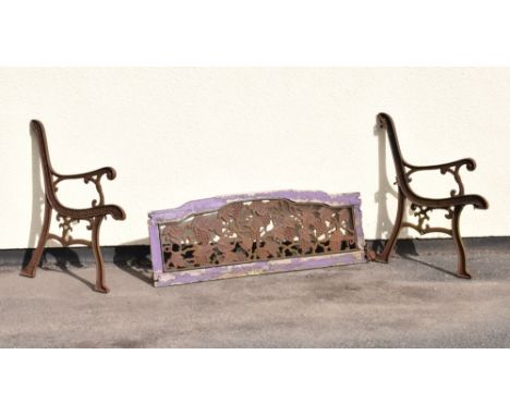 Pair of wrought metal garden bench/seat ends, together with a matching seat back with grapevine decoration, 125cm wide approx